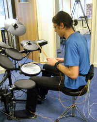 The Haptic Drum Kit for teaching drummers polyphonic rhythms. Photo by Simon Holland.